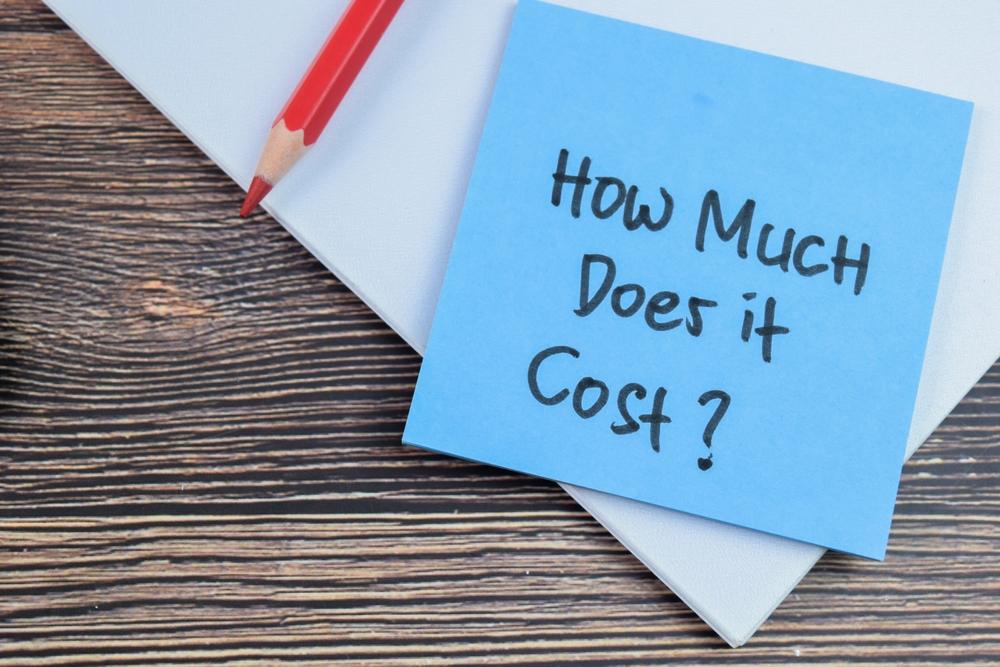 A blue sticky note reading “How much does it cost?” to symbolize the question of how much a long-term disability lawyer costs in Baton Rouge.